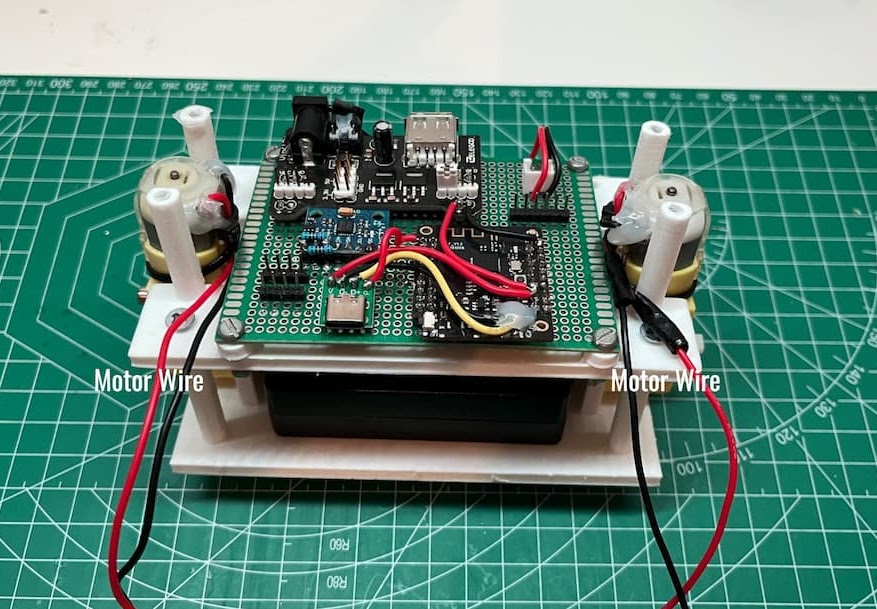A circuit board on the bottom of a 3D printed robot